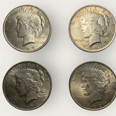 Four Peace Silver Dollars 