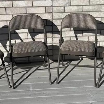 Four Fabric Cushioned Folding Chairs
