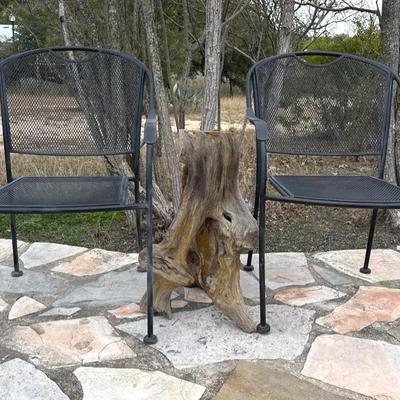 Set of black metal patio chairs & natural wooden base decor 