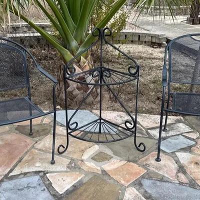 Pair of black metal patio chairs and metal corner shelf 