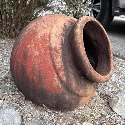 Large, slanted outdoor planter 