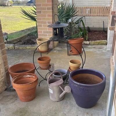 Metal plant stand, iron Japanese-style garden lantern, metal watering can, Eight pots various sizes