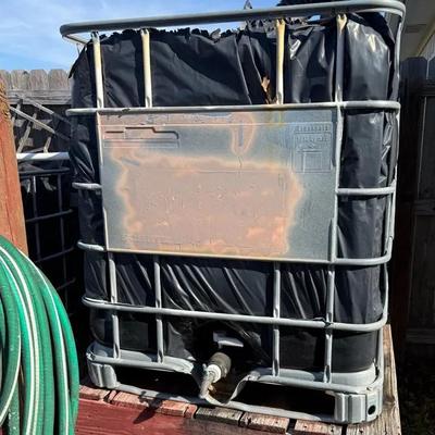 Two Rainwater Totes IBC Tanks (approximately 275 gallon each)