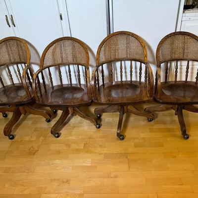 Set of Four Oak Swivel Office Chairs with Cane Backs | Adjustable Height