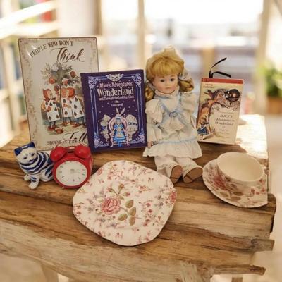  "Alice in Wonderland" Themed Decor Lot: Books, Porcelain Doll, Tea Set & More