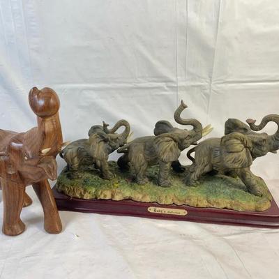 Two Elephant Figurines – Carved Wood Elephant & Resin Elephant Group