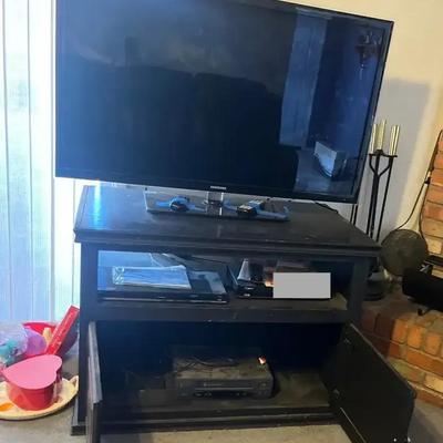 Medium Sized Black Wood Entertainment Center w/ TV, DVD Player, VHS Player