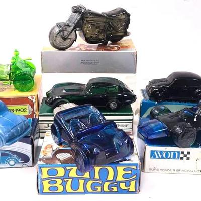 "Avon" After Shave Featuring a Variety of Automobiles 
