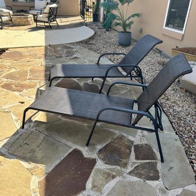 4 loungers with light beige cushions 