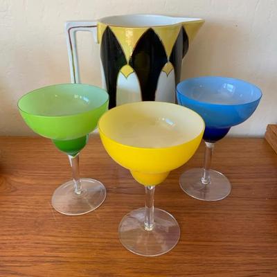 Three Margarita Glasses With A Pitcher