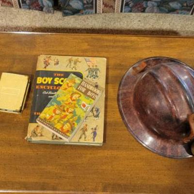 Sale Photo Thumbnail #221: miners helmet and lantern and vintage boy scout handbook