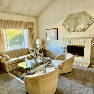 Living room set with swivel chairs