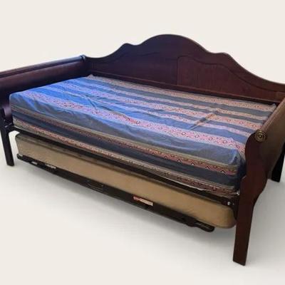 Wooden Sleigh Daybed With A Pullout Trundle