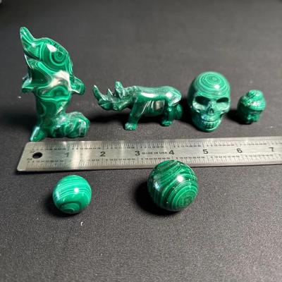 Mixed Lot of Malachite Carvings – Dolphin, Rhino, Skull, Buddha Head & Polished Spheres