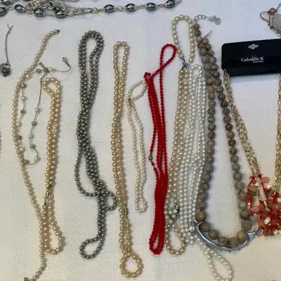 Beaded Necklaces. One Pair Of Pierced Earrings 