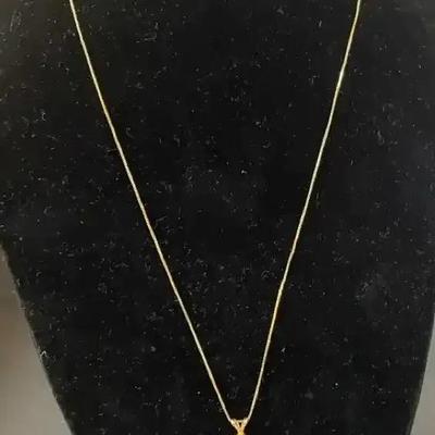 14k Gold 18” Women’s Chain And Pendant. TW 1.6 Grams Including Pendant