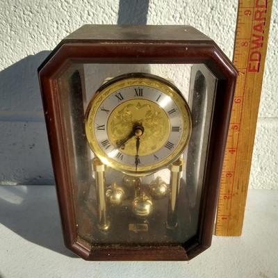 German battery operated clock in wooden case