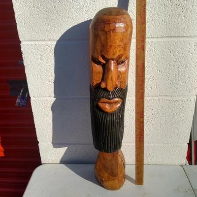 Carved wooden statue bust of a man with beard