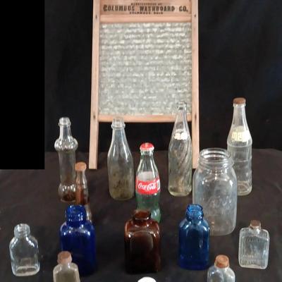 Old Glass Bottles and a Washboard