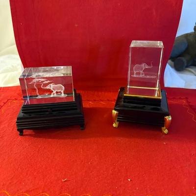 Pair of Laser-Etched Crystal Elephant Figurines on Decorative Stands