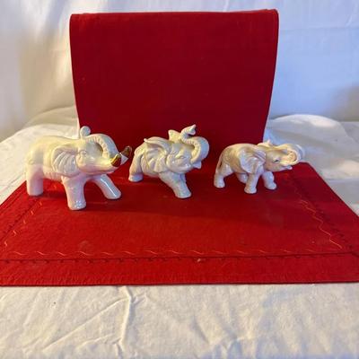 Set of Three White Porcelain Elephant Figurines