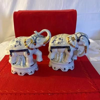Pair of Blue & White Porcelain Elephant Figurines with Gilt Accents”