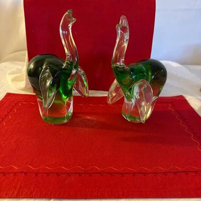 pair of handblown green art glass elephant figurines