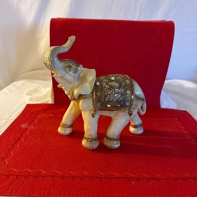 Decorative Porcelain Elephant Figurine with Ornate Saddle & Gilt Details”
