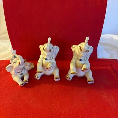 Set of Three Decorative Porcelain Elephant Figurines with Gilt Details