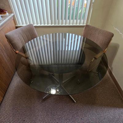 Mid century modern smoked glass top table, vintage Chromcraft chairs