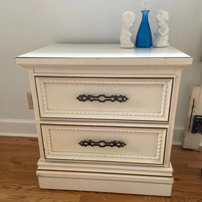 White Nightstand with Ceramics and Blue Glass Bud Vase 