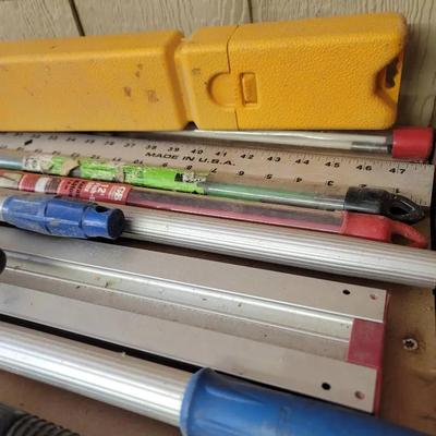 Shelf Lot Including Level, Adjustable Square, and More 