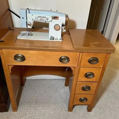 White Vintage Sewing Machine With Cabinet