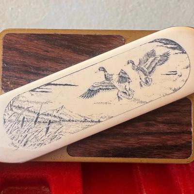 Sale Photo Thumbnail #43: Gerber Vintage Belt Buckle w/ Hidden Knife – Scrimshaw Duck Scene (w/ Box)