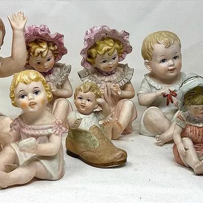 Porcelain Piano babies By Andrea Sadek
