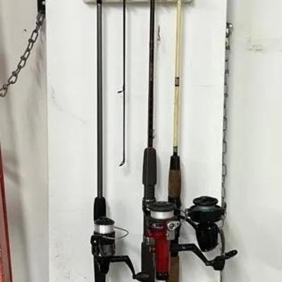 4 Fishing Rods And Tackle Box