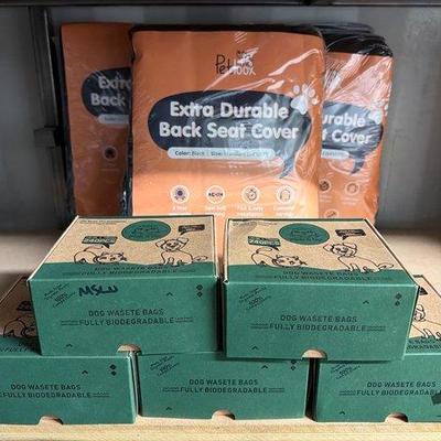 5524 • 5 boxes of dog waste bags and 3 back seat covers