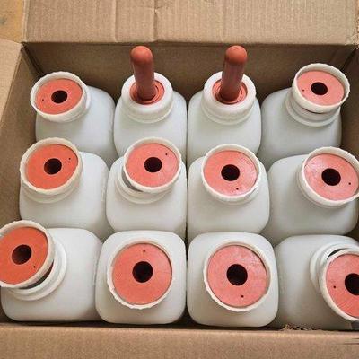 5560 • (12) calf feeding bottles