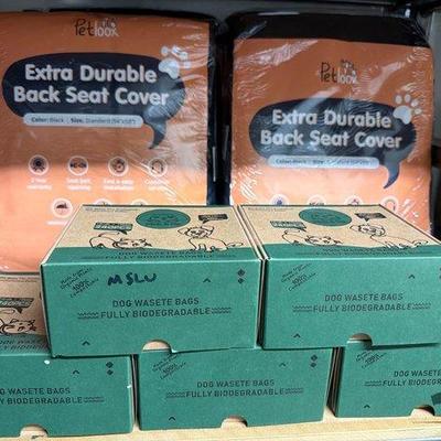5526 • 5 boxes of dog waste bags and 4 back seat covers