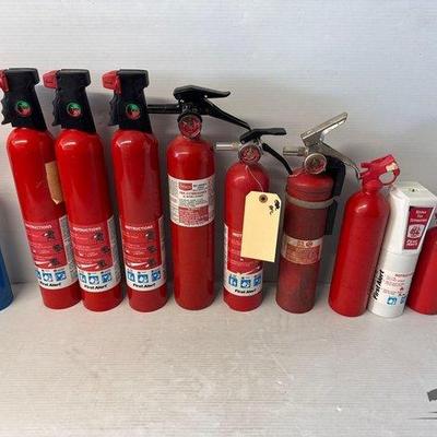 5594 • collection of fire extinguishers and one propane torch