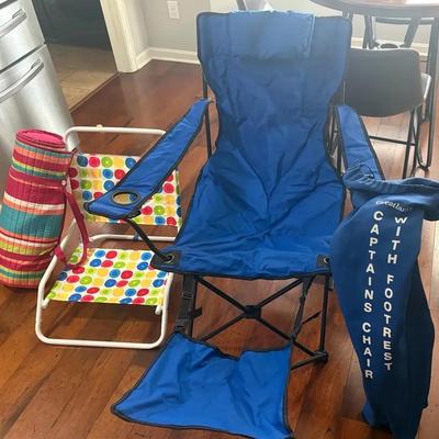 Two Beach Chairs And One Beach Towel 