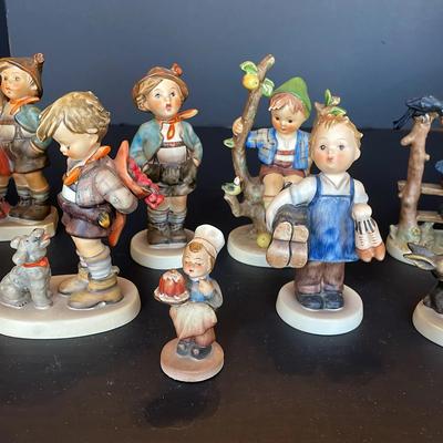 Sale Photo Thumbnail #27: 9 Hummel Figurines 