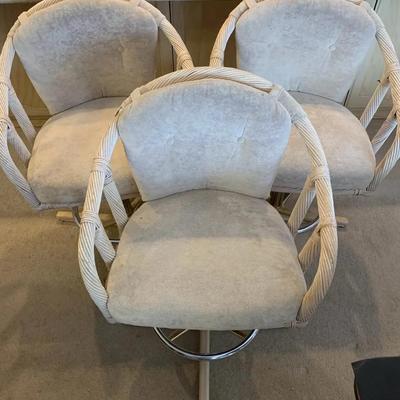 3 Swivel Chairs 
