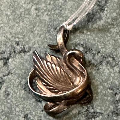 Sale Photo Thumbnail #89: Signed Gloria Vanderbilt Sterling swan pendant
