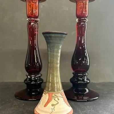 A Teresa Cole Pottery Bud Vase With A Pair Of Red-Amber Glass Candlesticks