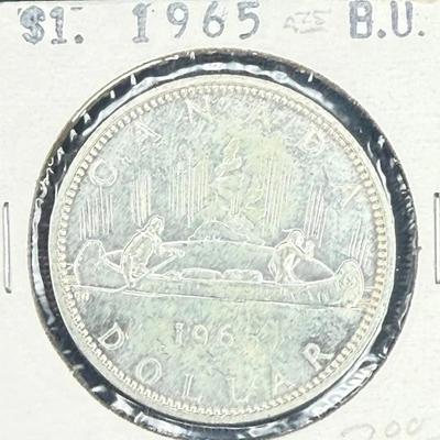 1965 canadian silver dollar in brilliant uncirculated condition