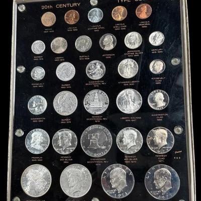 Collection of u s. 20th century type coins in a display holder.