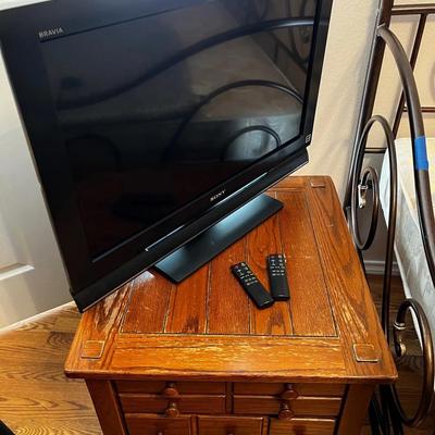 Wood side table plus 31” TV