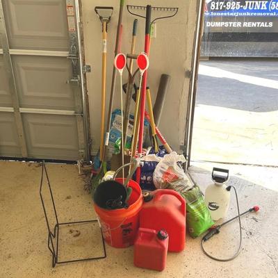 Garden Tools With Various Bags Of Potting Mix