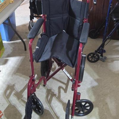 Sale Photo Thumbnail #115: Medline lightweight foldable transport wheelchair with handbrakes